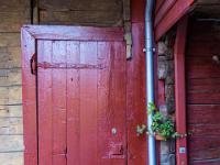 Schmälere Tür an einem Bryggen Holzhaus - Bergen